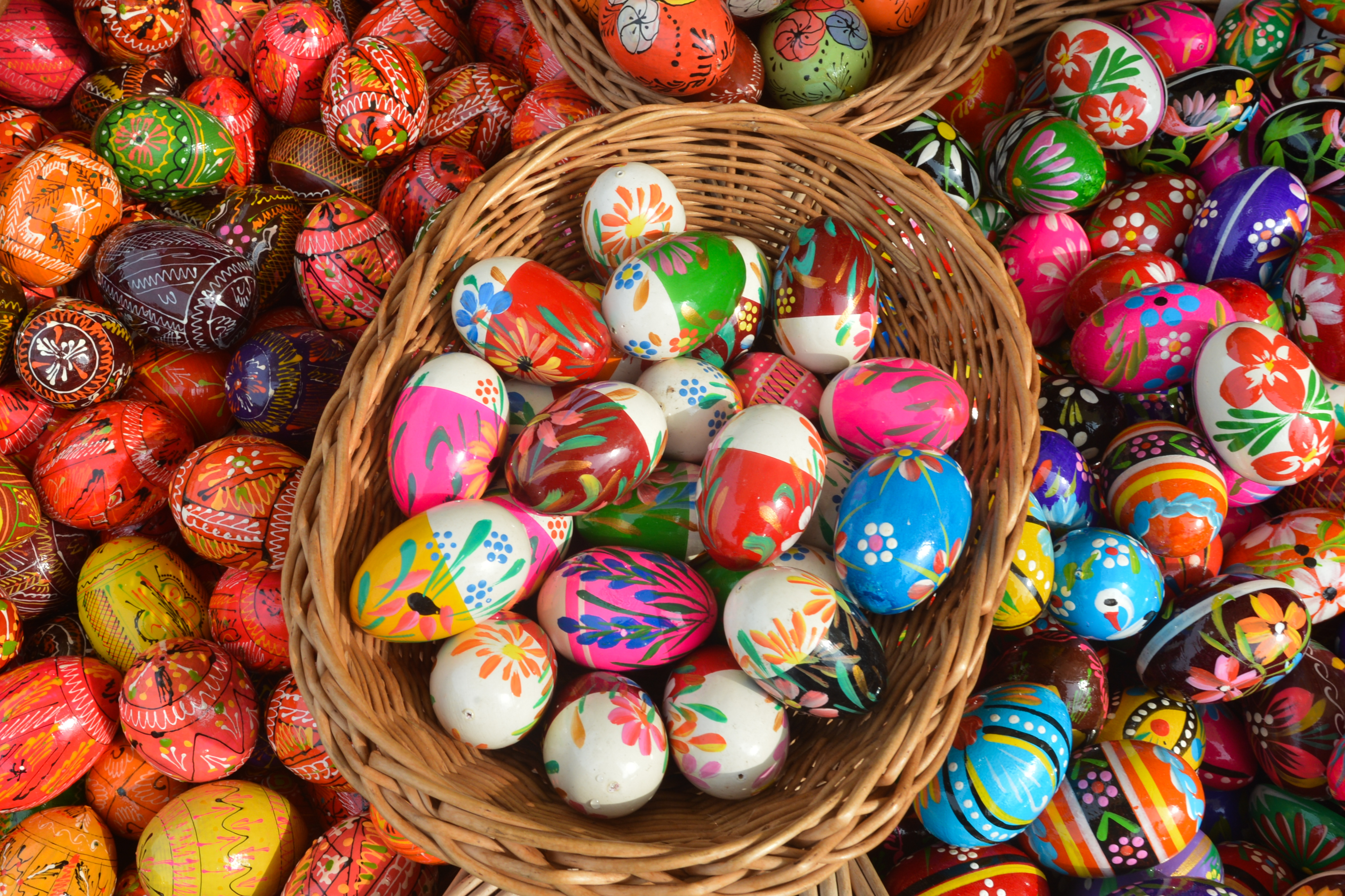 Hand made traditional hand painted Easter eggs (Polish: Pisanki) and baskets on display for sale on Krakow