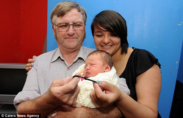 Vikki Taylor Wilson pictured with her son Isaac who was born on the back room floor with the help of her father in law Stephen Wilson who used the lace from a trainer to tie the umbilical cord