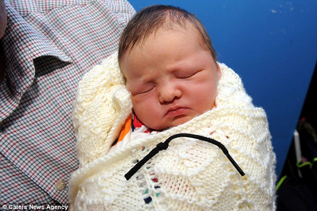 Sudden: Baby Isaac was born on the hall floor after his mother Vikki had just four contractions