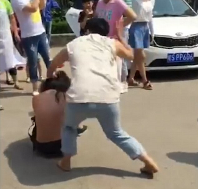 Vicious: In the shocking footage, the group of women can be seen hitting the alleged mistress