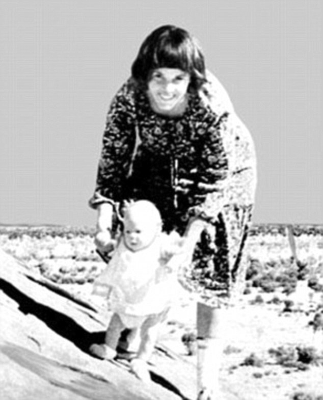 In August 1980, the couple were camping at the base of Uluru in the Northern Territory when their youngest child, nine-week-old Azaria (pictured with Ms Chamberlain) was taken from the family tent