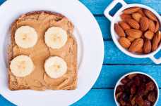 Toast with Almond Butter and Banana + Raisins - Weight Loss Resources